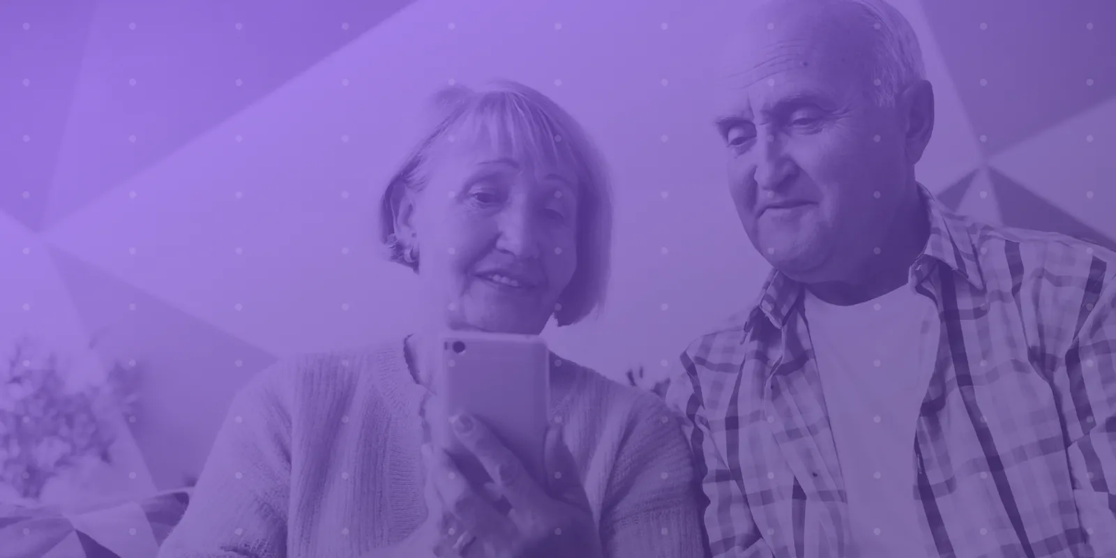 Seniors on phone. Image for Article.